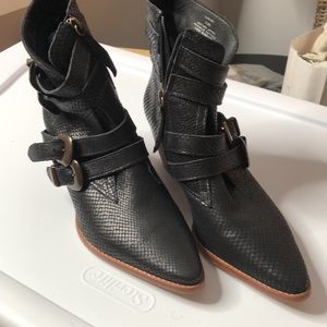 Brand new leather booties with inside zips and decorative clasps